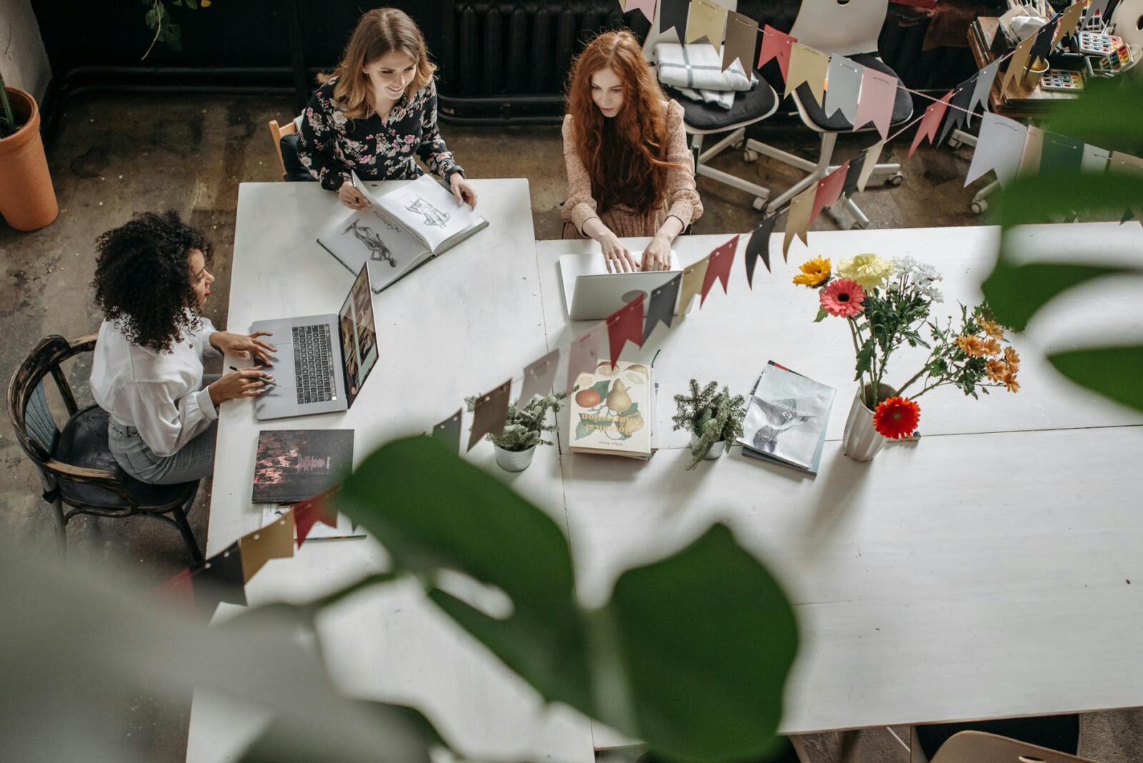 woman sitting at a table working together