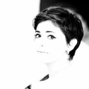 woman in black shirt grayscale photo