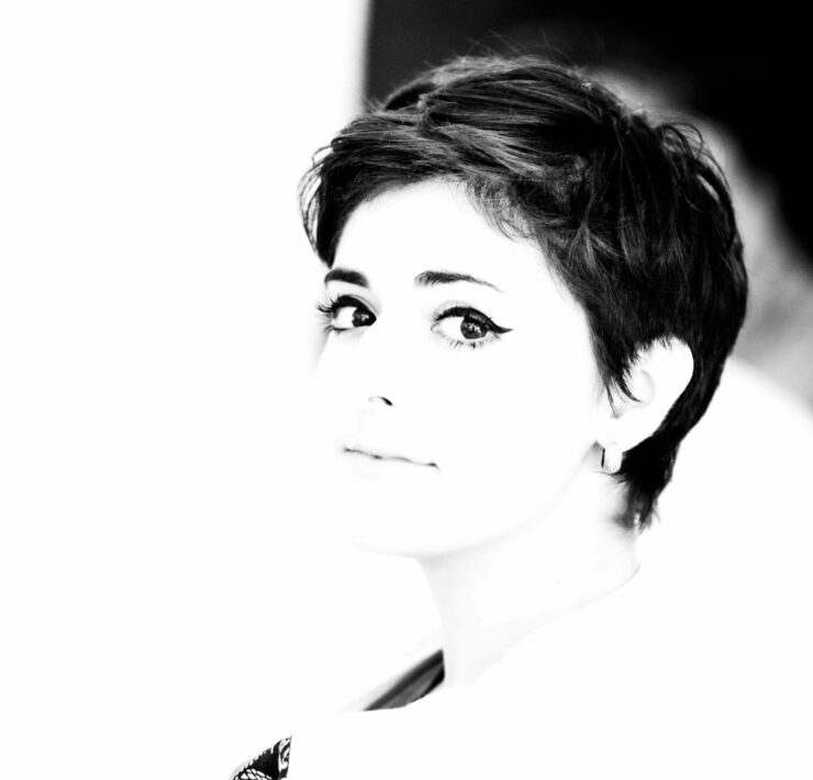 woman in black shirt grayscale photo